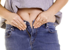 Woman in too tight jeans dreamstimeextrasmall_18031155